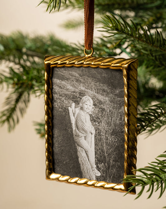 Ornement de cadre en laiton tressé