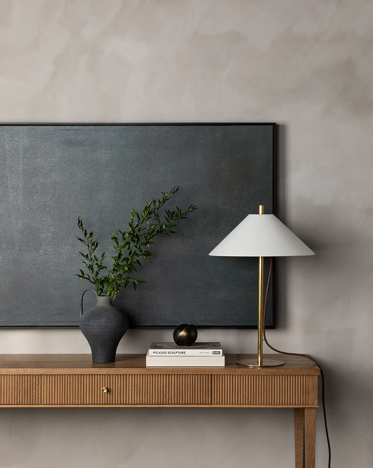 Cruche en terre cuite au charbon de bois