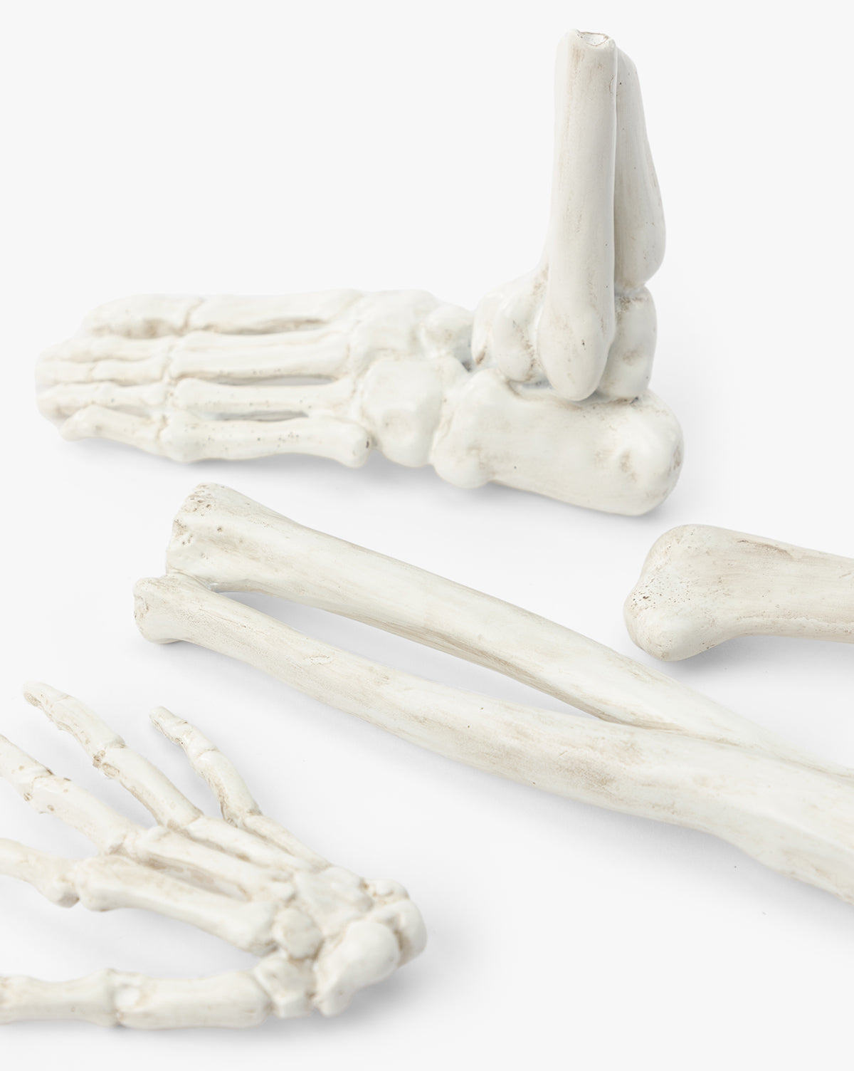Os de squelette en résine dans un sac à cordon (lot de 4)