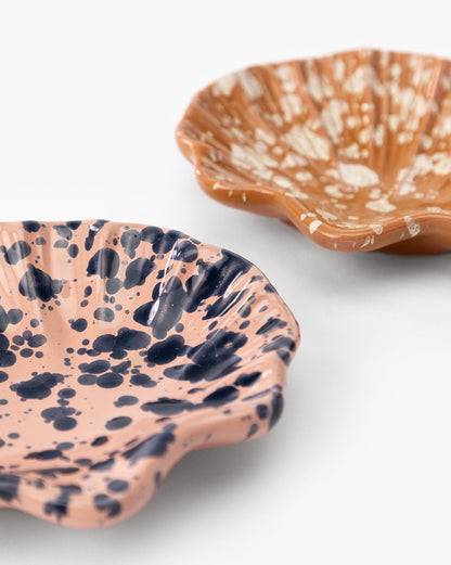 Plat à coquillages éclaboussés