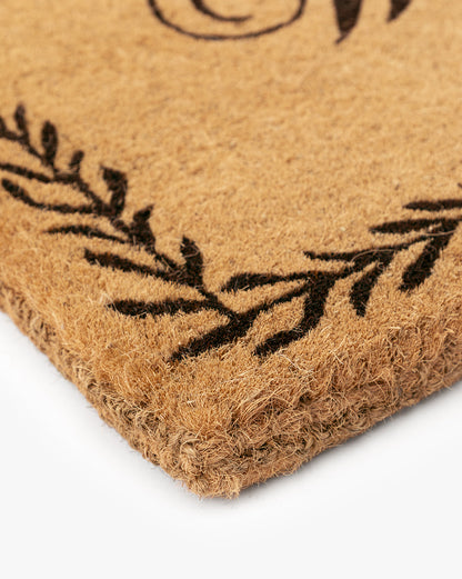 Paillasson de bienvenue avec bordure en feuilles